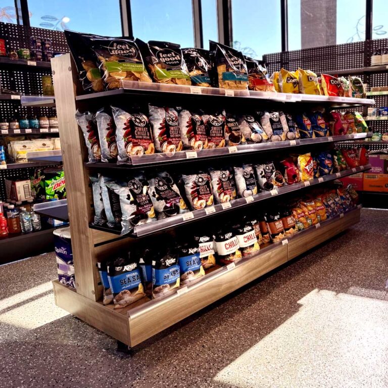 Slatwall gondola dissplay shelving in a petrol station.