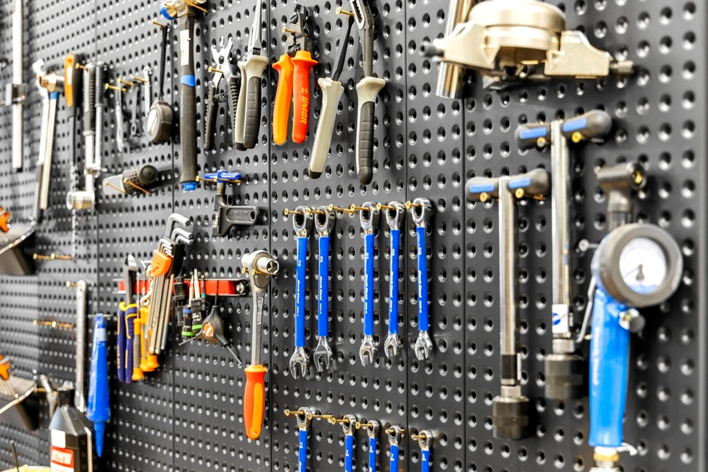 Dinya Pegboards with hooks and tools on display.